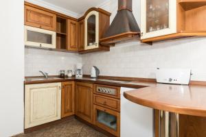Kuchyňa alebo kuchynka v ubytovaní Jantar Apartamenty - Penthouse Sea View Morska