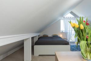Posteľ alebo postele v izbe v ubytovaní Jantar Apartamenty - Penthouse Sea View Morska