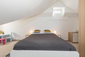Posteľ alebo postele v izbe v ubytovaní Jantar Apartamenty - Penthouse Sea View Morska