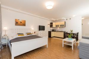 Posteľ alebo postele v izbe v ubytovaní Jantar Apartamenty- Zielone Tarasy