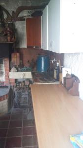 Kuchyň nebo kuchyňský kout v ubytování Apartmani Meriko
