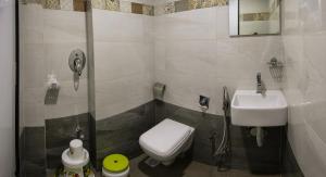 Koupelna v ubytování Hotel Pearl