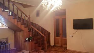 TV a/nebo společenská místnost v ubytování Areguni Guest House