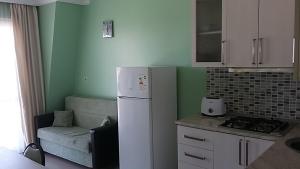 A cozinha ou kitchenette de Mancho's Apartment 8