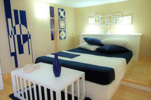 Кровать или кровати в номере Virna House a Castellammare del Golfo