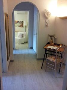 A bed or beds in a room at La Casetta - Near the sea & free parking