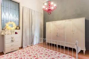 En eller flere senge i et værelse på Il Giardino Del Corso