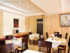Reštaurácia alebo iné gastronomické zariadenie v ubytovaní Cleopatra Classic Hotel