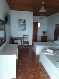 Voodi või voodid majutusasutuse Hotel Riviera toas