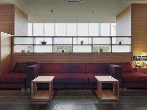 Posezení v ubytování Candeo Hotels Sano