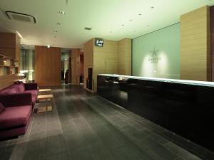 Posezení v ubytování Candeo Hotels Sano