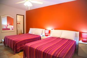 Ein Bett oder Betten in einem Zimmer der Unterkunft Contadora Island Inn