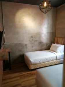 Postel nebo postele na pokoji v ubytování The Rise Room