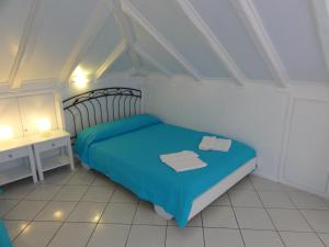 Postel nebo postele na pokoji v ubytování Botsis Guest House