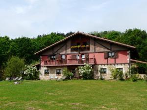 a large house with a large yard in front of it at Casa Rural Haritzpe in Hondarribia