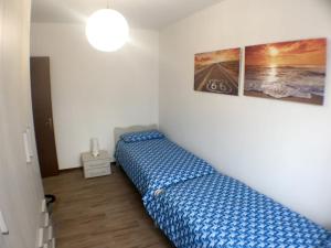 A bed or beds in a room at Appartamenti Giacomo Noventa