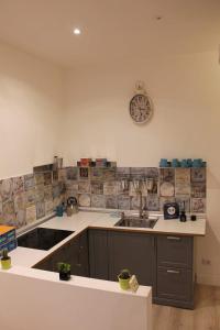 Η κουζίνα ή μικρή κουζίνα στο Spazio Cavour Guesthouse +39 φωτογραφίες