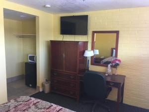 Postel nebo postele na pokoji v ubytování Blue Star Inn