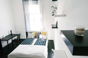 Posteľ alebo postele v izbe v ubytovaní d.Five Stylish Apartment on Váci Street