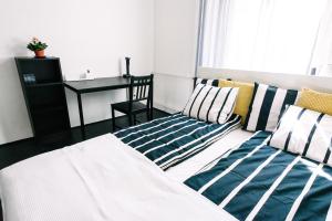 Posteľ alebo postele v izbe v ubytovaní d.Five Stylish Apartment on Váci Street