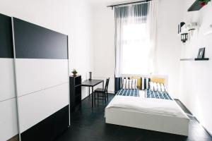Posteľ alebo postele v izbe v ubytovaní d.Five Stylish Apartment on Váci Street