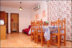 Posedenie v ubytovaní Bungalow en complejo II
