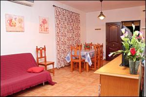 Posedenie v ubytovaní Bungalow en complejo II