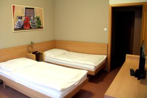 Posteľ alebo postele v izbe v ubytovaní Hotel Iberia