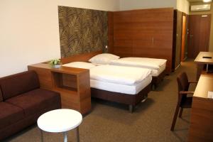 Posteľ alebo postele v izbe v ubytovaní Hotel Iberia