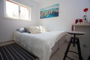 Postel nebo postele na pokoji v ubytování Studio apartment Laganini