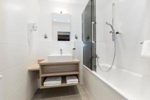 Bilik mandi di Hotel Altmünsterhof