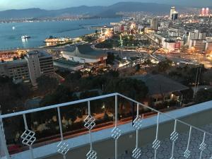a view of the city from the balcony at Büyük Konak İzmir in İzmir