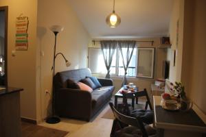 a living room with a couch and a table at Santa Cruz in Ribadeo