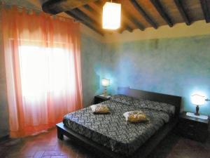 A bed or beds in a room at Villa S.Anna