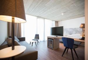TV a/nebo společenská místnost v ubytování arte Hotel Kufstein