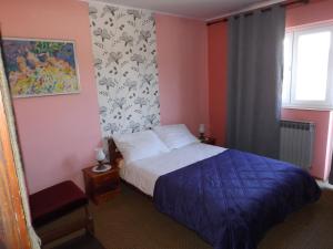 Guest House Raukar客房内的一张或多张床位