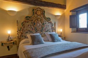
Cama o camas de una habitación en Hotel Cal Sastre

