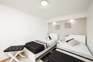 Ένα ή περισσότερα κρεβάτια σε δωμάτιο στο Casa Alto da Ladeira