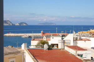 a view of the ocean from the roofs of buildings at Maridea - Via Dragonara in Ponza