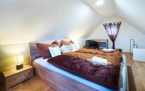 Postel nebo postele na pokoji v ubytování Bluestars Apartments