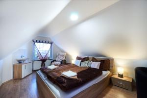 Postel nebo postele na pokoji v ubytování Bluestars Apartments