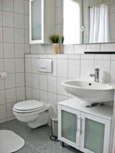 Ванная комната в Zuhause auf Zeit Bielefeld