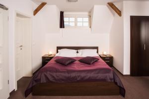מיטה או מיטות בחדר ב-Vila Monet