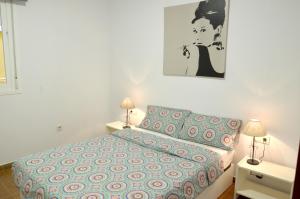 Posteľ alebo postele v izbe v ubytovaní Apartamento San Jacinto