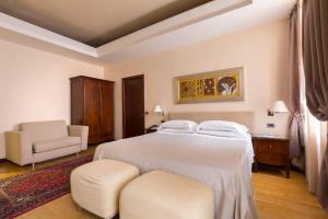 Una cama o camas en una habitación de Hotel Liassidi Palace