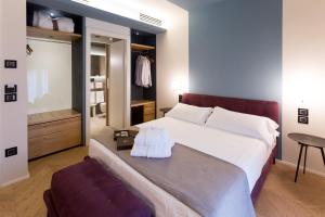Postel nebo postele na pokoji v ubytování Hotel Silla