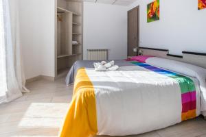 Postel nebo postele na pokoji v ubytování Hostal Pardo
