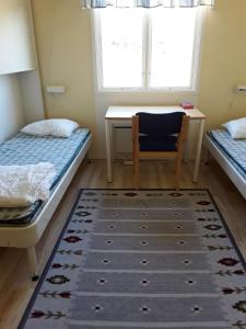 Postel nebo postele na pokoji v ubytování Stegeborgsgården
