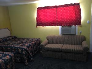 Postel nebo postele na pokoji v ubytování Blue Star Inn