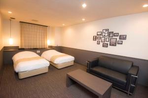 Postel nebo postele na pokoji v ubytování Hotel Double Funabashi + 37 fotografií